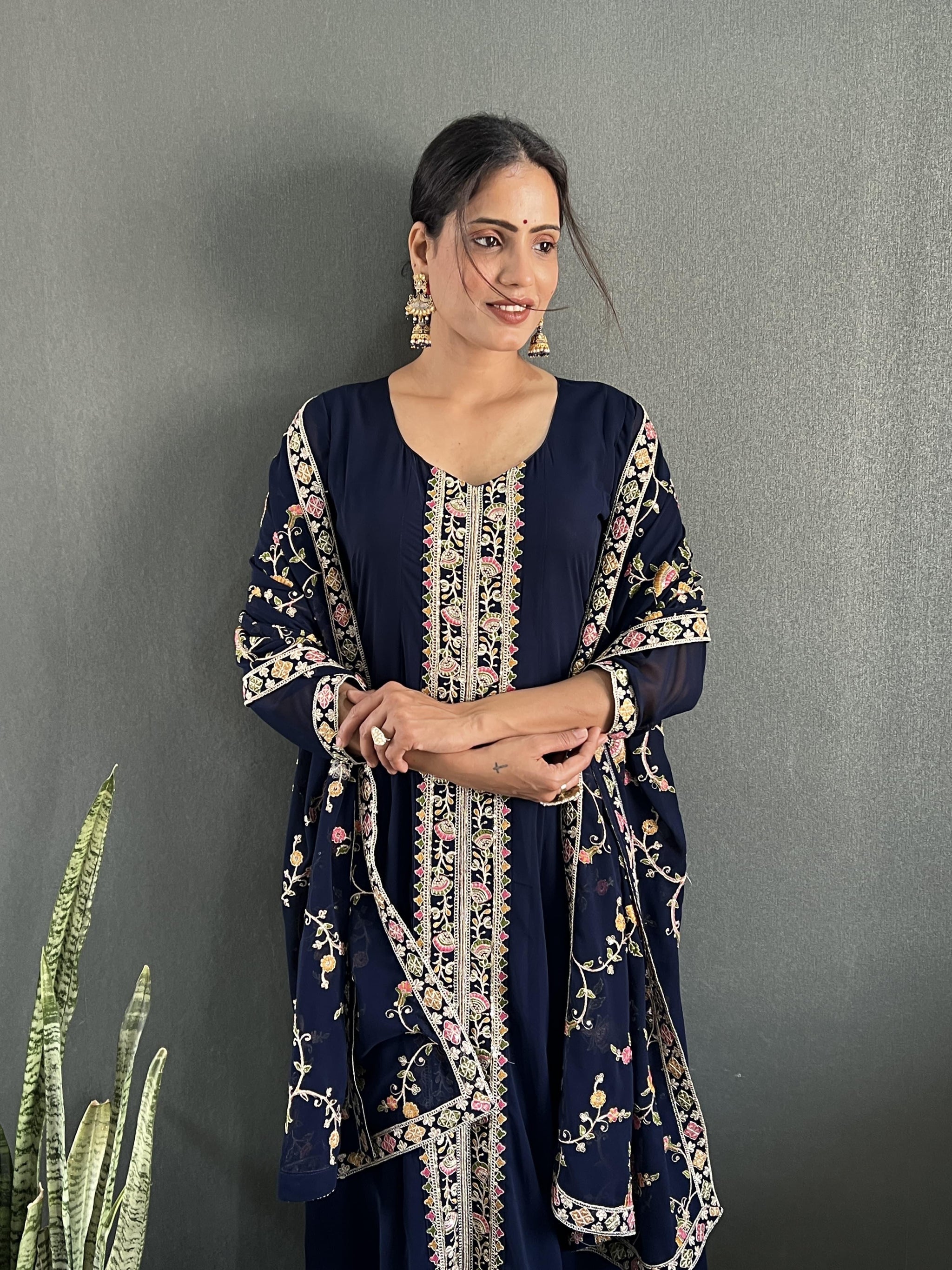 Stunning Vichitra Anarkali Set featuring exquisite embroidery work.