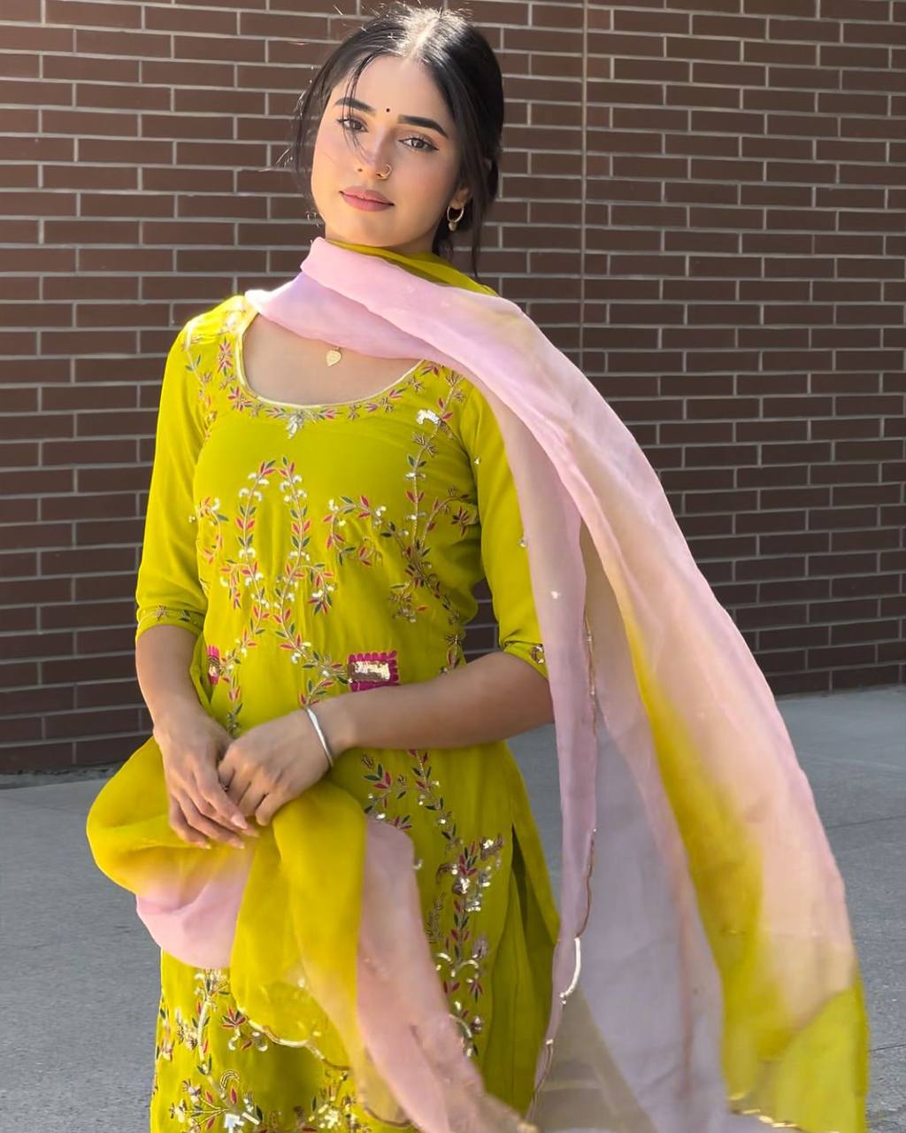 Make a stunning festive statement with this Designer Wear Exclusive Sharara Suit