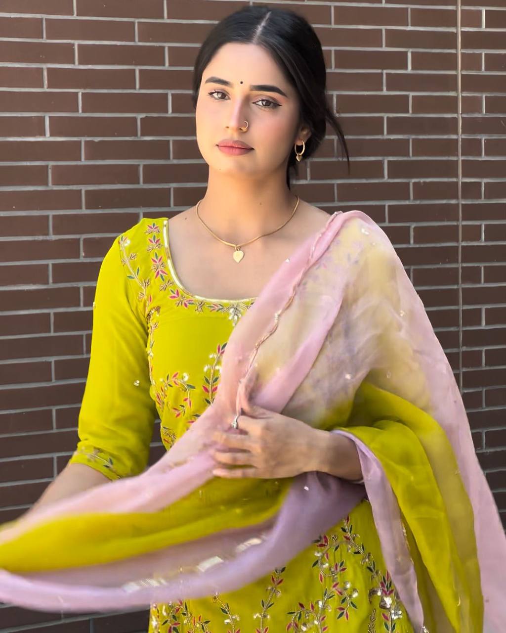 Make a stunning festive statement with this Designer Wear Exclusive Sharara Suit