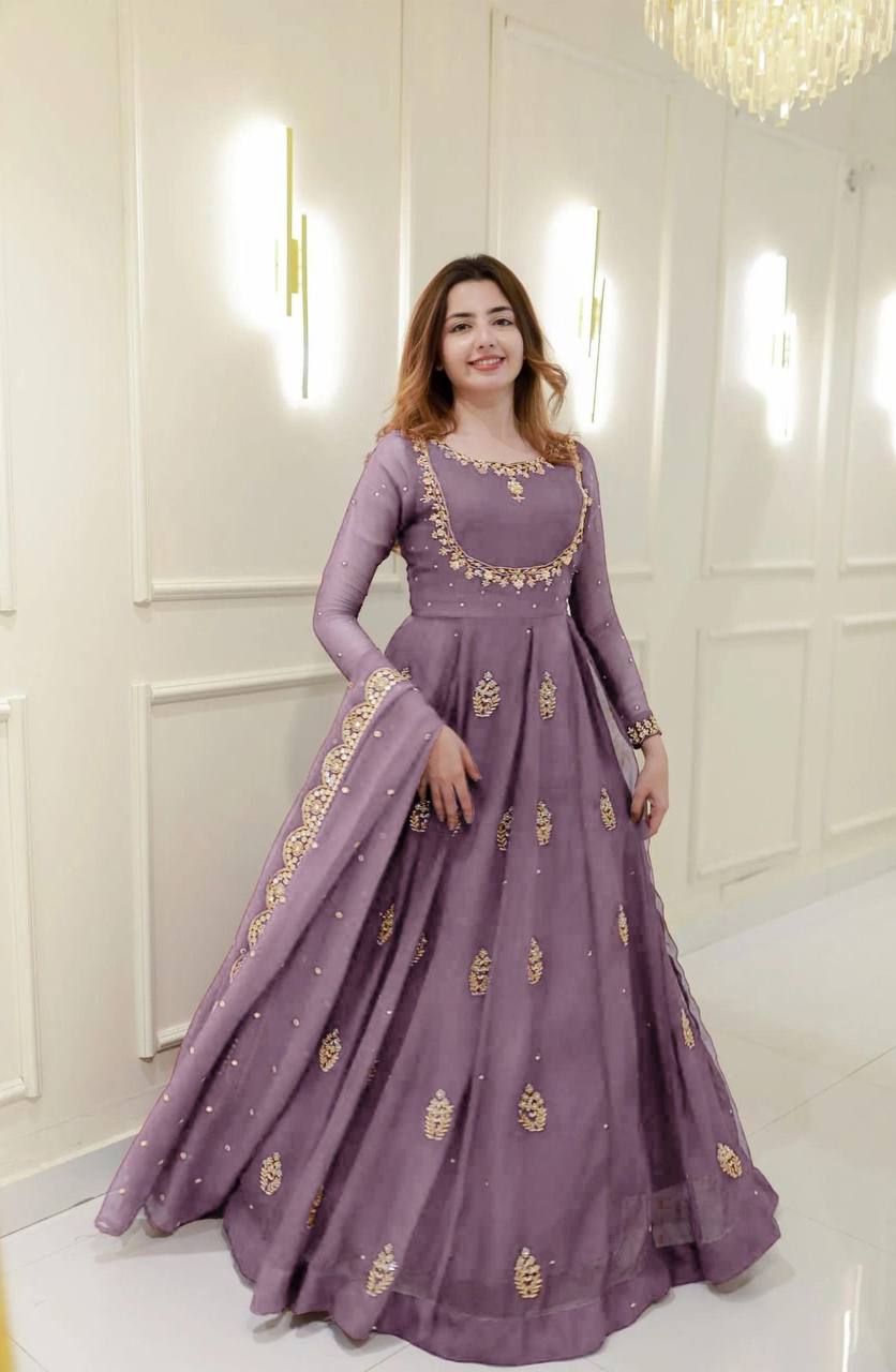 Add a touch of glamour to your festive collection with this Exclusive 2-Piece Gown and Dupatta Set