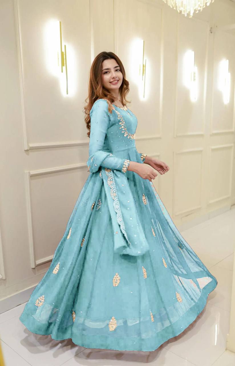 Add a touch of glamour to your festive collection with this Exclusive 2-Piece Gown and Dupatta Set