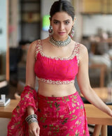 Crafted from premium Faux Georgette, this saree features digital print work, 2-layer ruffle detailing