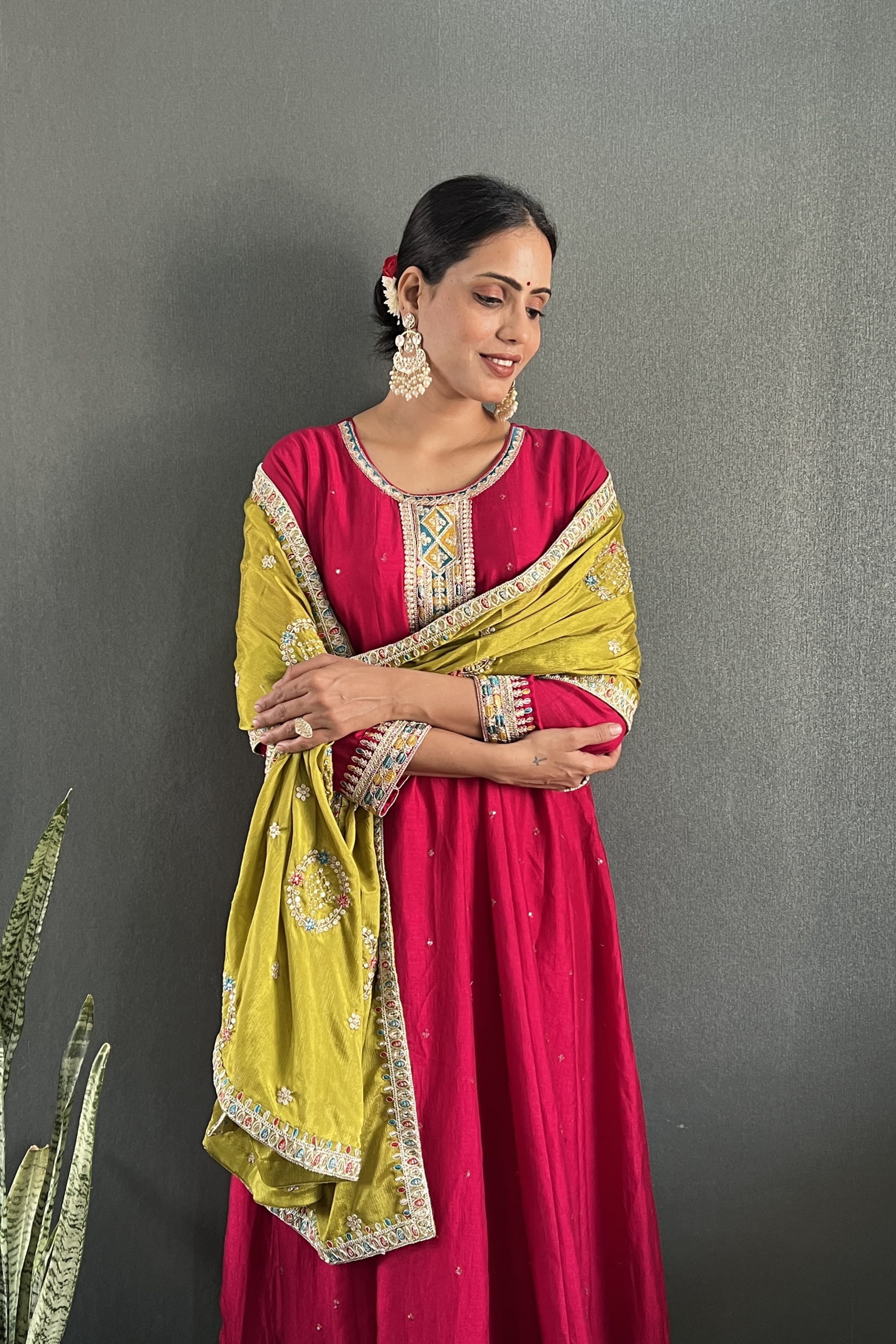 Stunning Vichitra Anarkali set featuring exquisite embroidery work.
