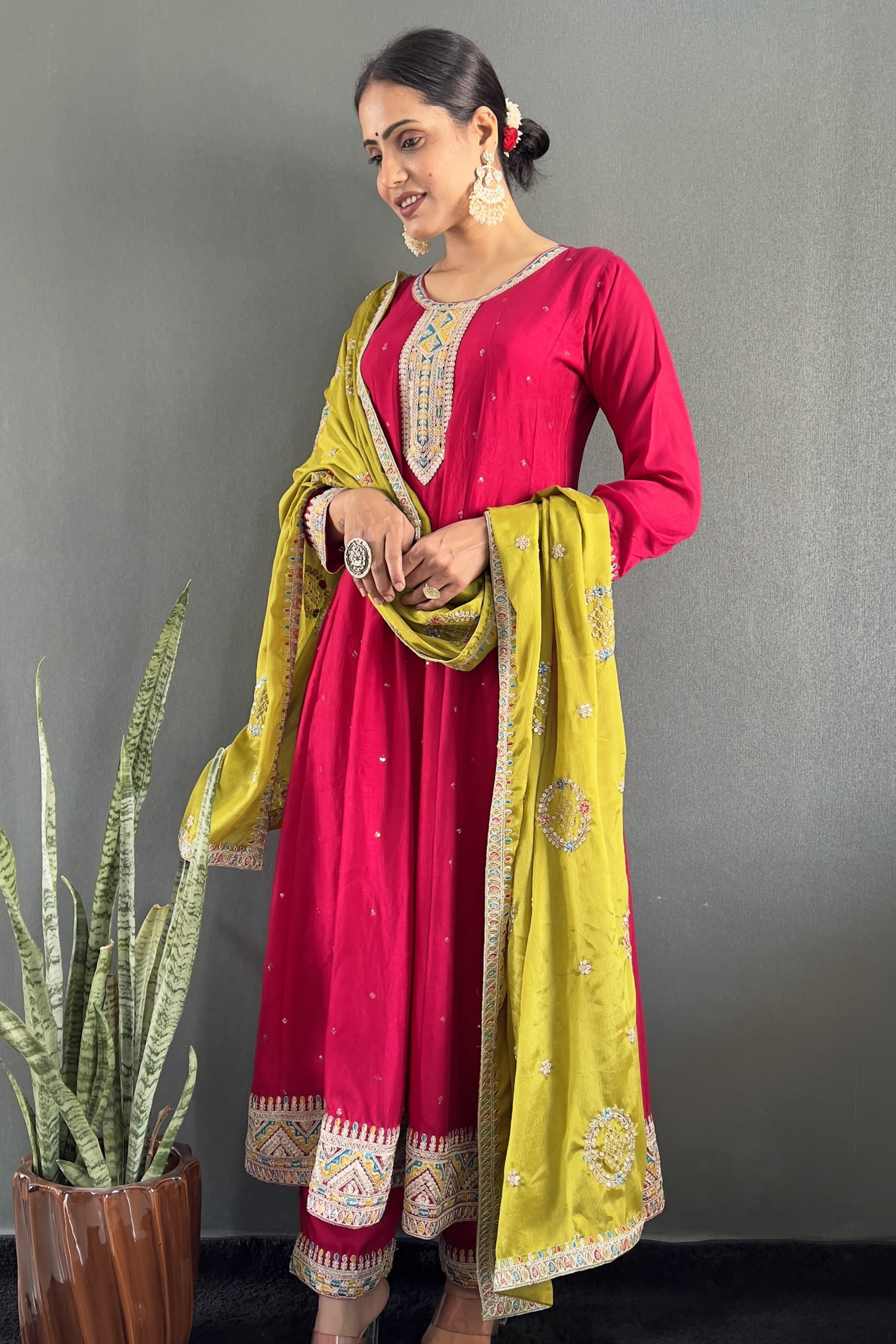 Stunning Vichitra Anarkali set featuring exquisite embroidery work.