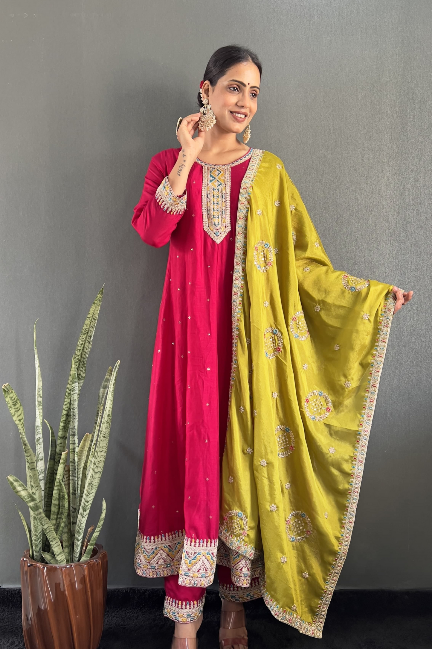 Stunning Vichitra Anarkali set featuring exquisite embroidery work.
