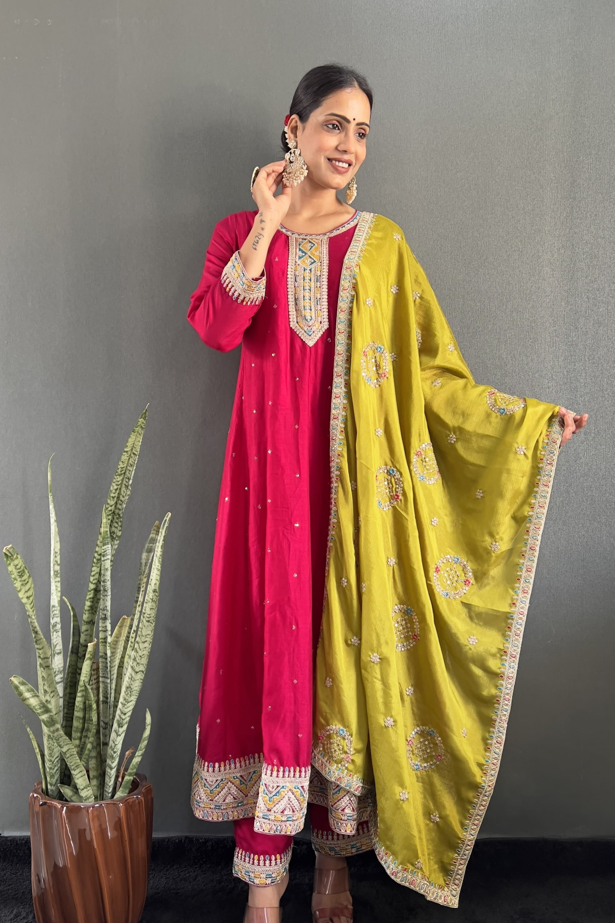 Stunning Vichitra Anarkali set featuring exquisite embroidery work.